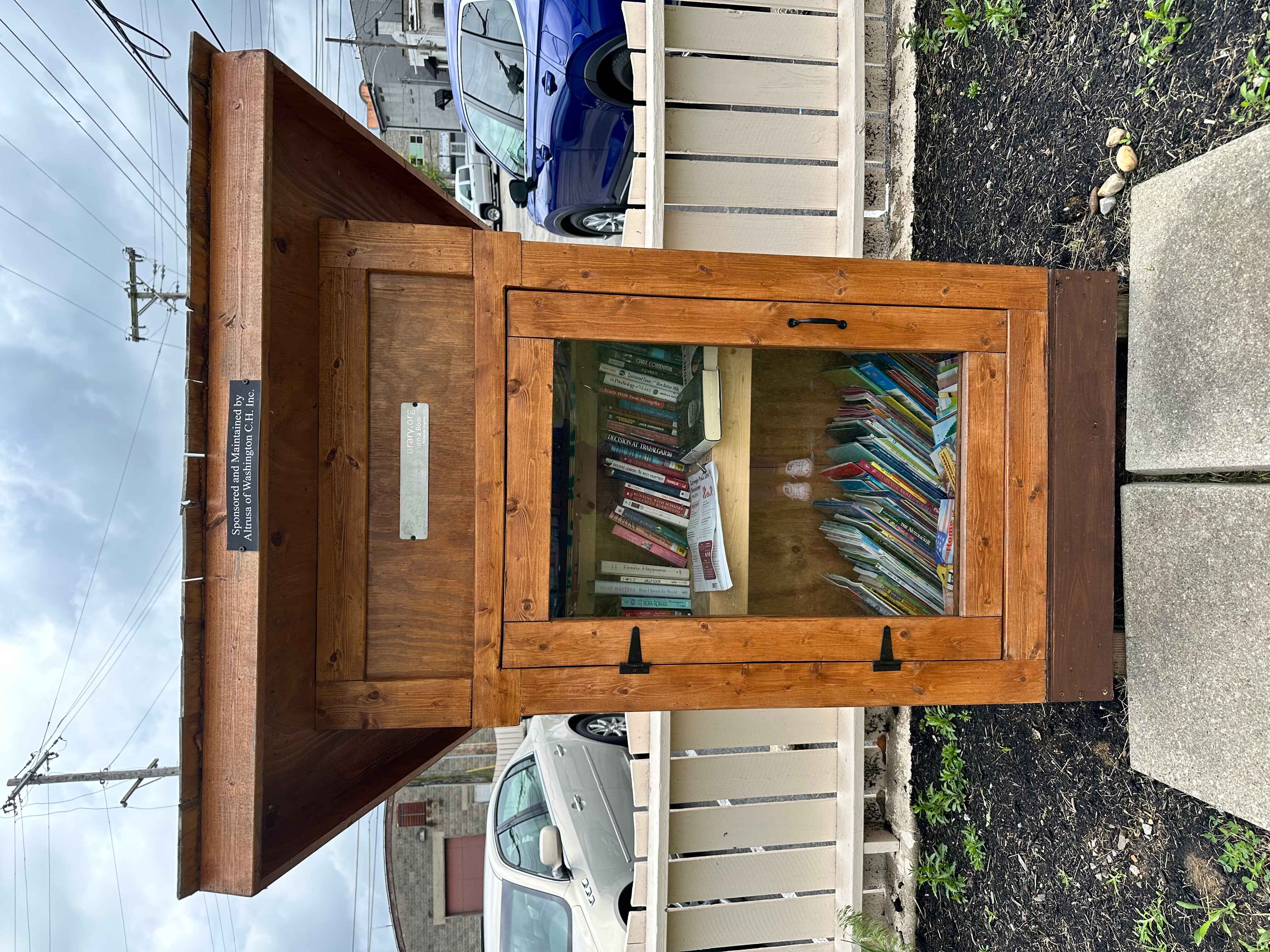 Little Free Library in library garden. 